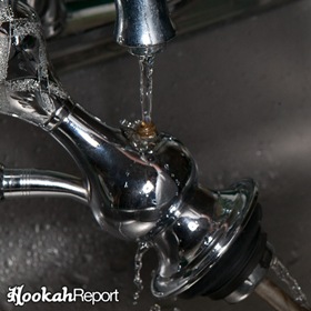 Running water through hookah purge valve